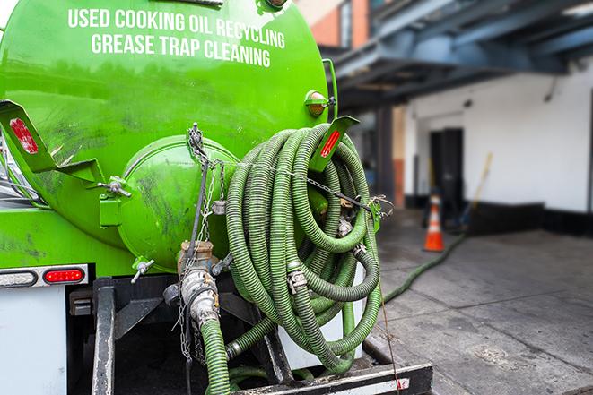 routine pumping of grease trap at a cafeteria in Calhoun